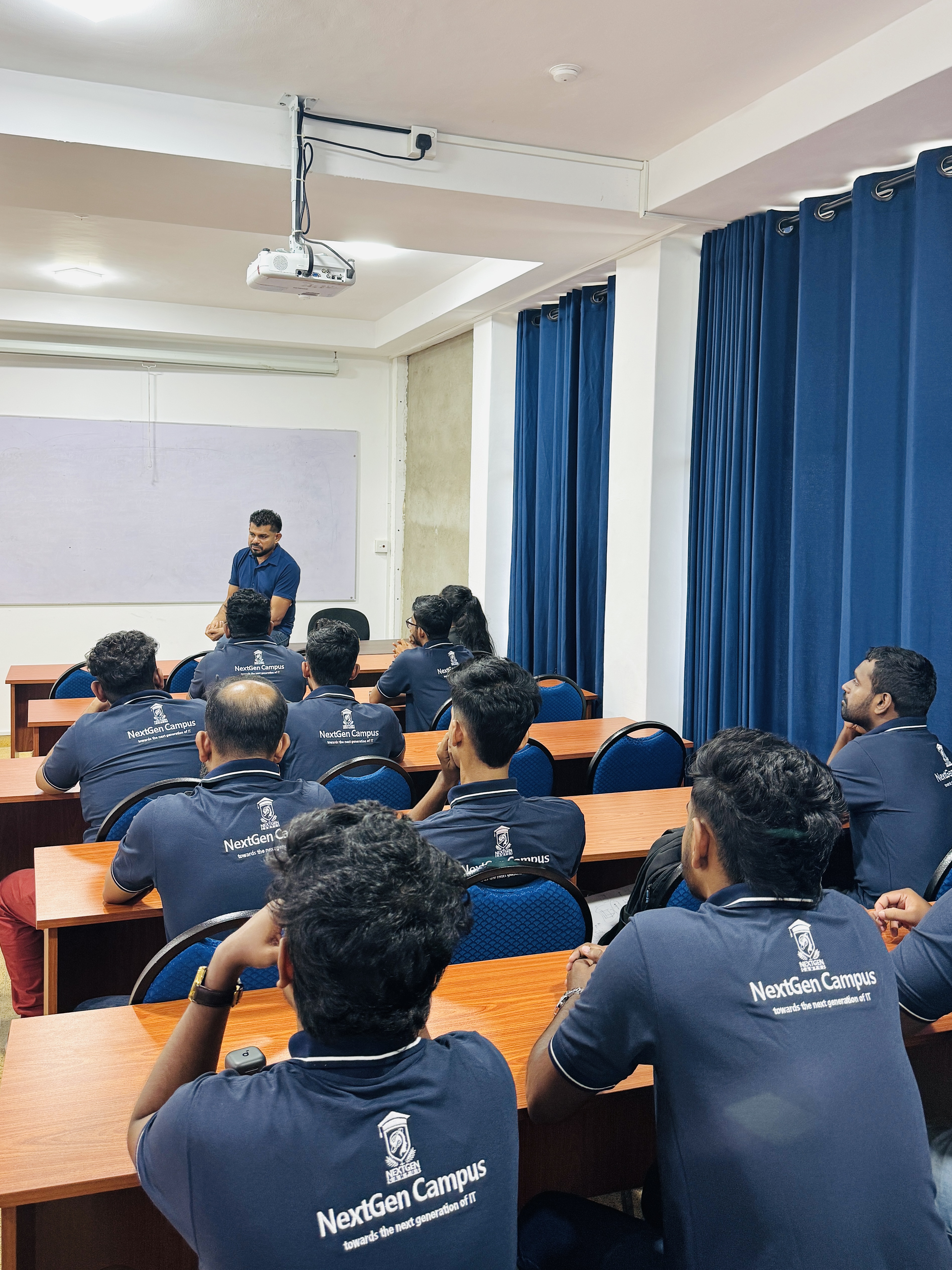 Instructor leading a NextGen Campus boot camp classroom session with students