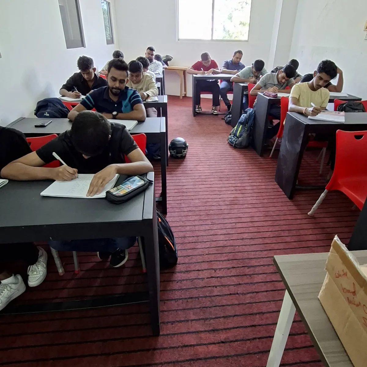 Students completing practical learning activities in a NextGen Campus classroom